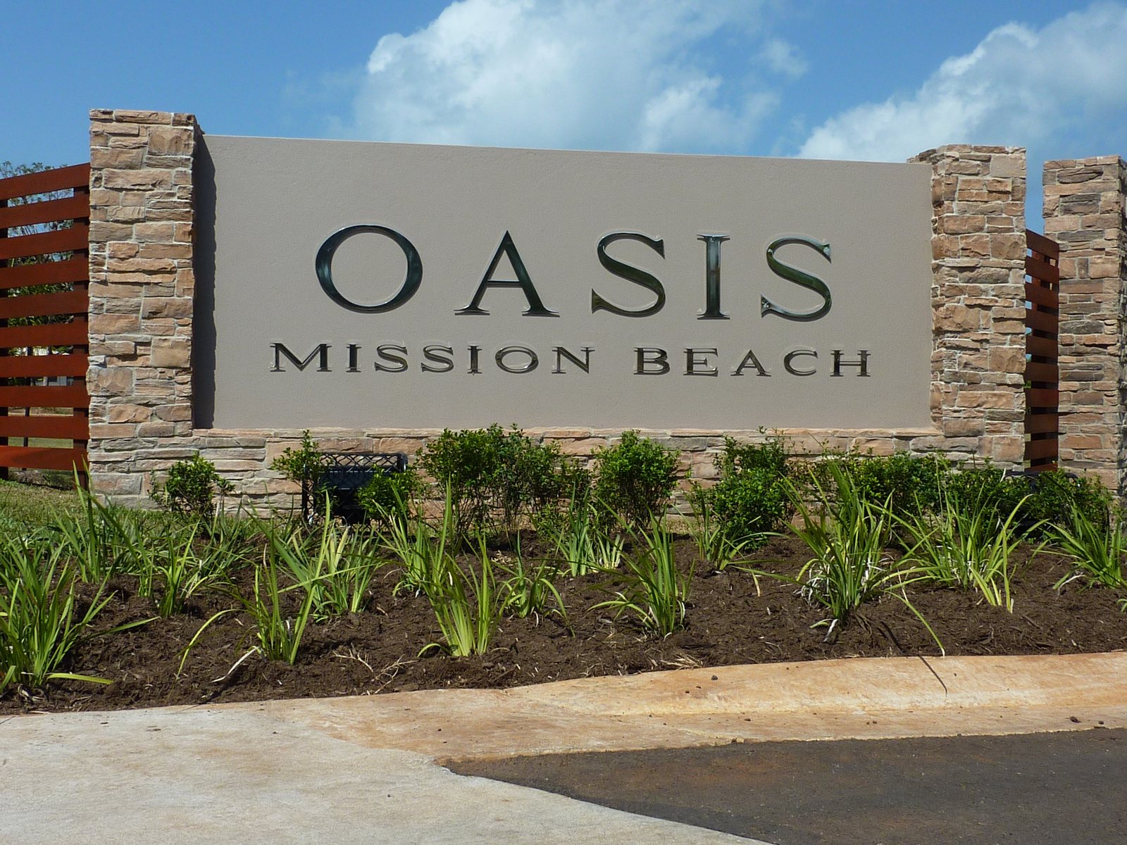Oasis, Mission Beach, QLD — the Oasis entry signage
