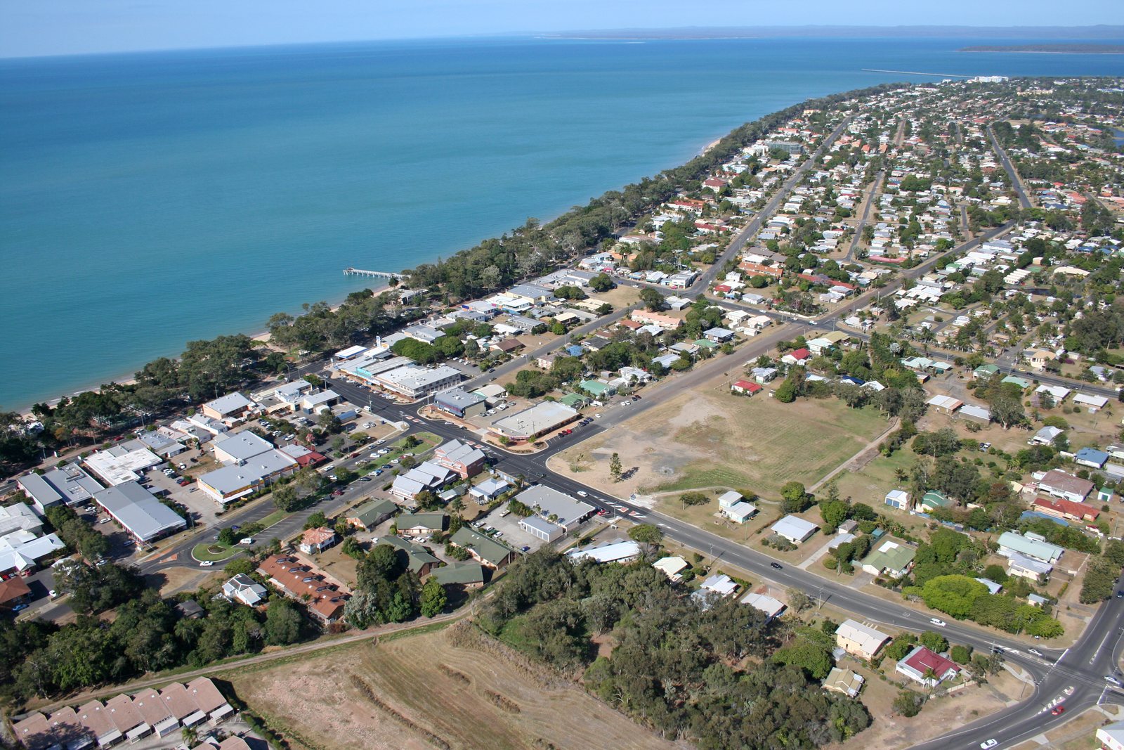 Waterfront, Hervey Bay, QLD — aerial view of the site and coastline
